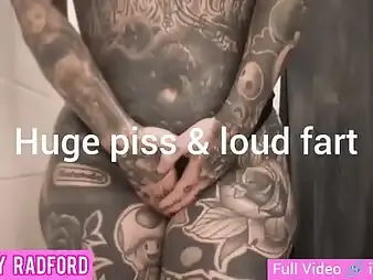 Melody Radford's inked bod gets wet close to piss and farts like a professional