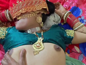 Beautiful Indian couple engaged in passionate bedroom activities